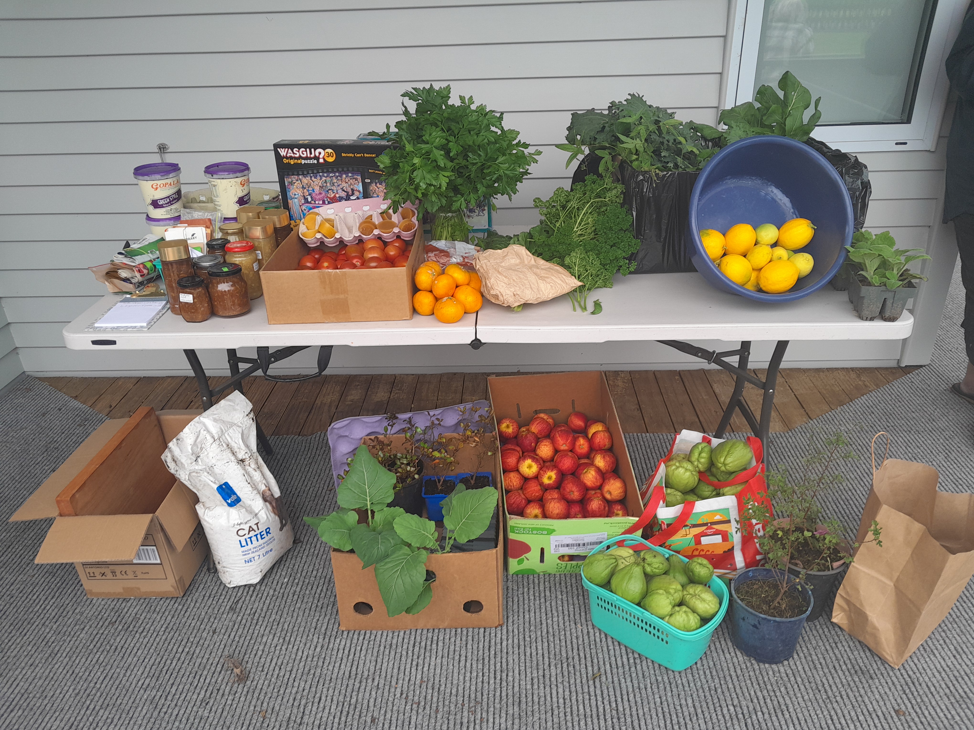 Table overflowing with winter produce at our last crop swap, 2nd June.