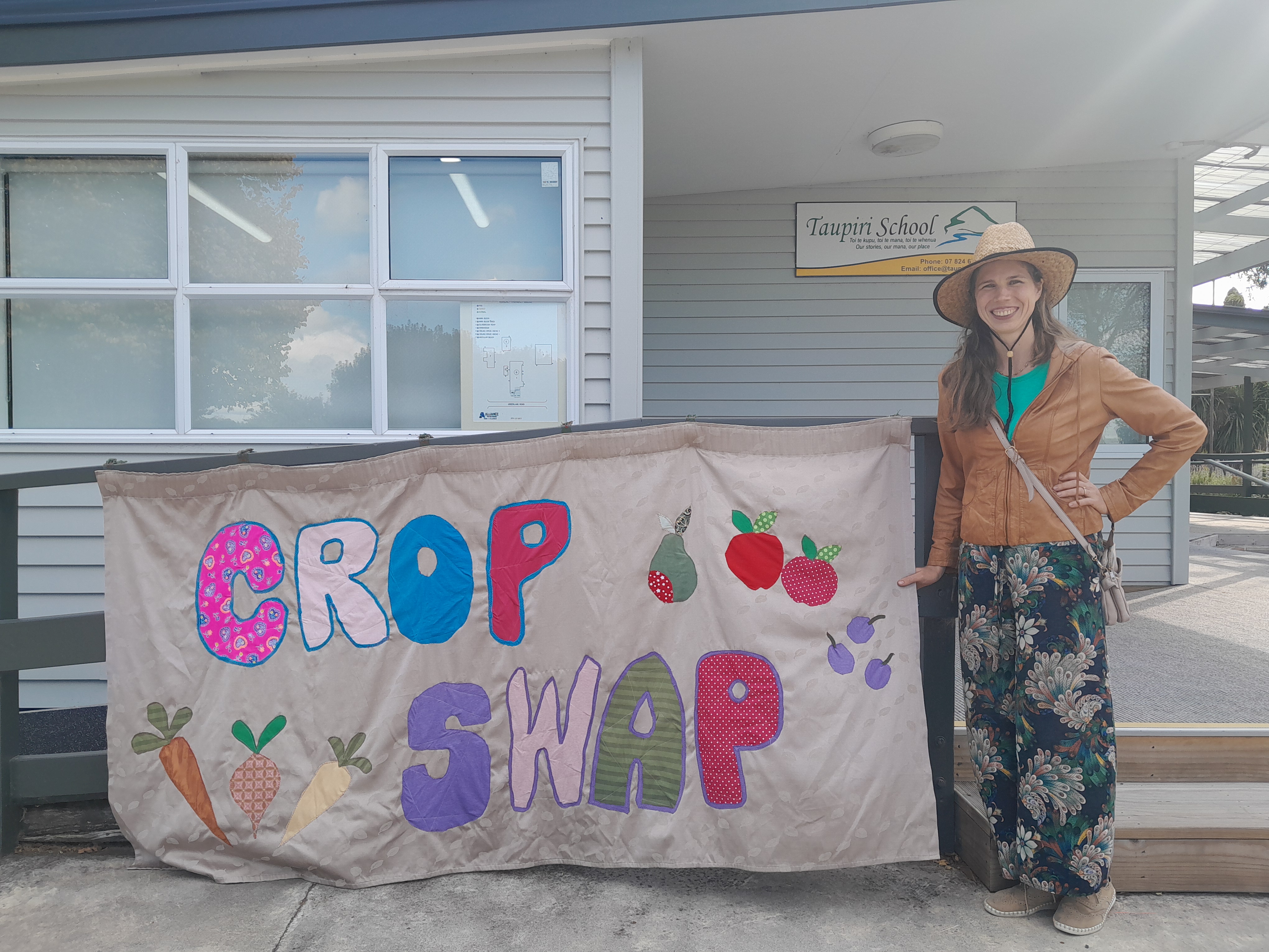 Shannon posing by our new Crop Swap Banner.